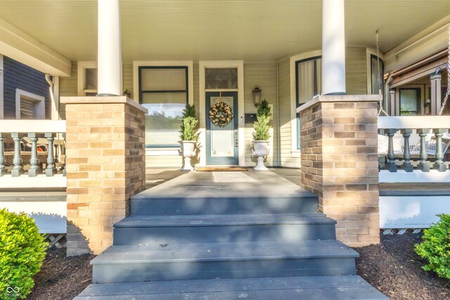 1471 N Delaware St, Indianapolis, IN 46202 - doorway to property with a porch