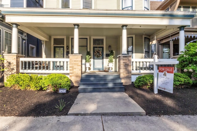 1471 N Delaware St, Indianapolis, IN 46202 - doorway to property with a porch