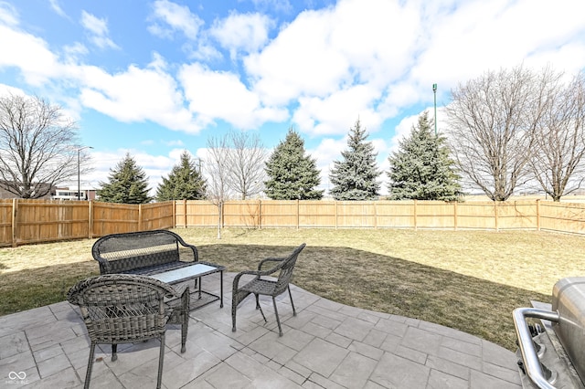 view of patio with a fenced backyard