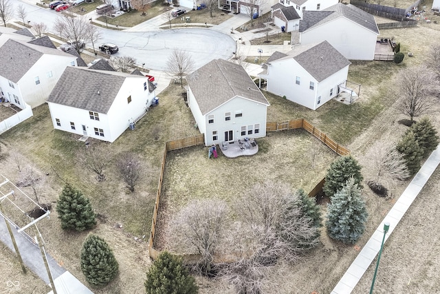 birds eye view of property with a residential view