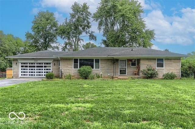 single story home featuring a front lawn, aphalt driveway, stone siding, an attached garage, and a chimney