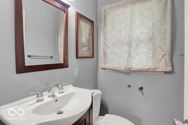 half bath with toilet and vanity