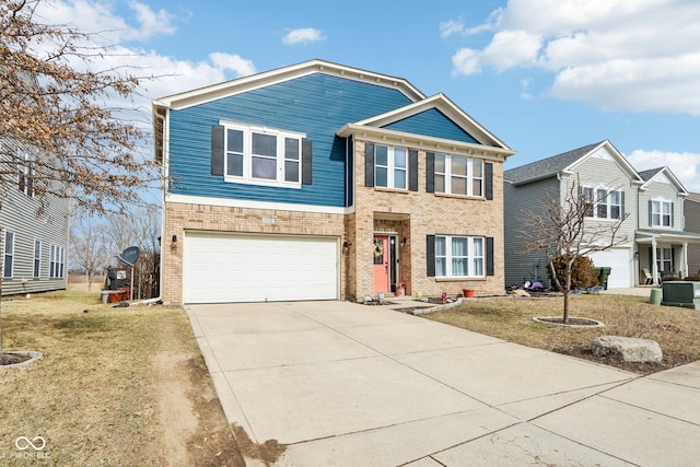 view of front of property featuring a garage, concrete driveway, and brick siding