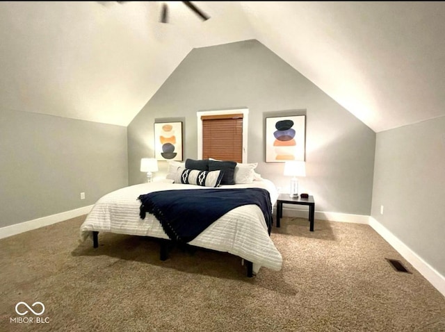 carpeted bedroom with lofted ceiling, visible vents, a ceiling fan, and baseboards