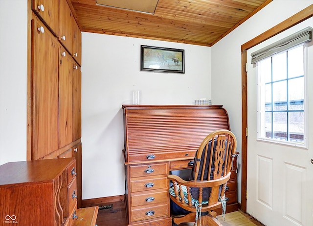 office space featuring baseboards, wooden ceiling, and light wood-style floors