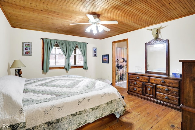 bedroom featuring ceiling fan, wooden ceiling, and hardwood / wood-style flooring