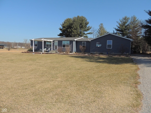 ranch-style house with a front yard