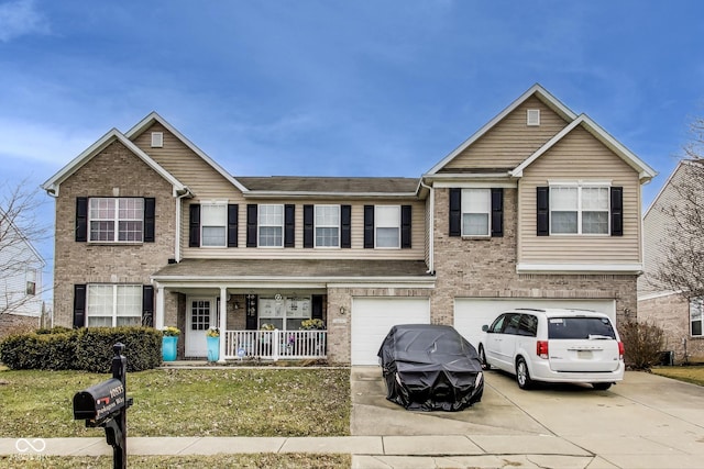 view of front facade with concrete driveway, brick siding, and a porch