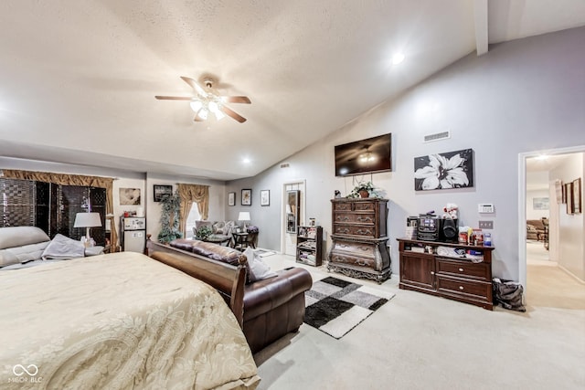 bedroom with a ceiling fan, light colored carpet, visible vents, and high vaulted ceiling