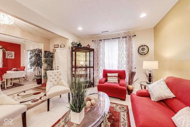 living room with recessed lighting and visible vents