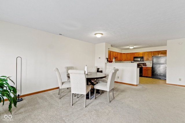 dining area with visible vents, light colored carpet, and baseboards