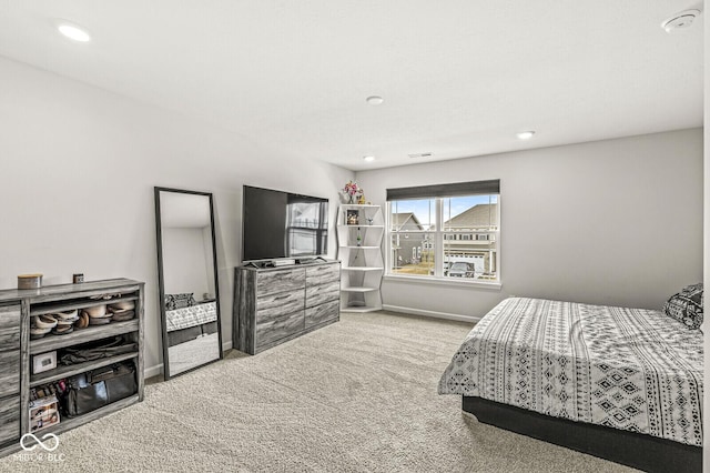 bedroom with carpet, baseboards, and recessed lighting