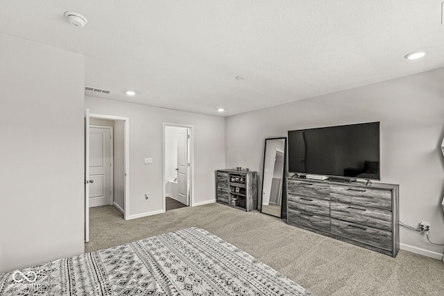 carpeted bedroom with baseboards, visible vents, and recessed lighting