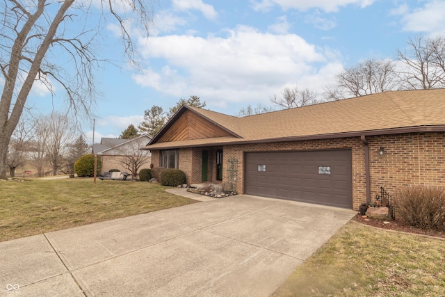 view of front of home with driveway, a front lawn, an attached garage, a shingled roof, and brick siding