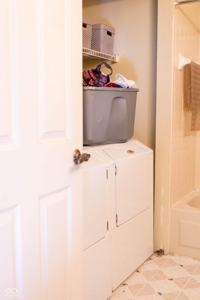 laundry room with washer and clothes dryer