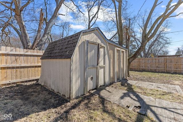 view of shed featuring a fenced backyard