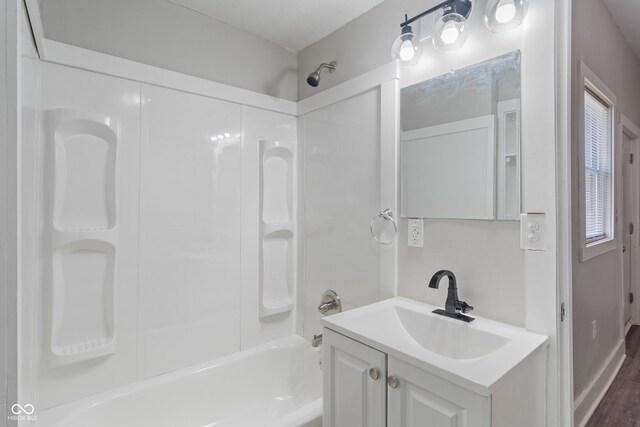 569 N Tacoma Ave, Indianapolis, IN 46201 - full bathroom featuring vanity and shower / bathtub combination