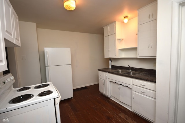 kitchen with dark wood finished floors, open shelves, dark countertops, a sink, and white appliances