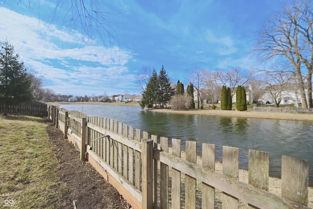 water view featuring fence