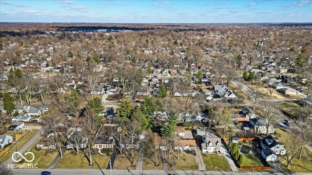 birds eye view of property with a residential view