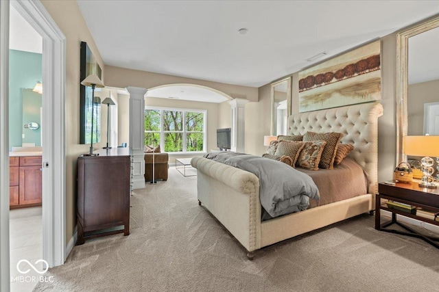 681 Greenford Trl N, Carmel, IN 46032 - bedroom with ornate columns and light carpet