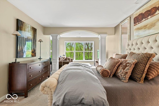 681 Greenford Trl N, Carmel, IN 46032 - carpeted bedroom featuring ornate columns and arched walkways