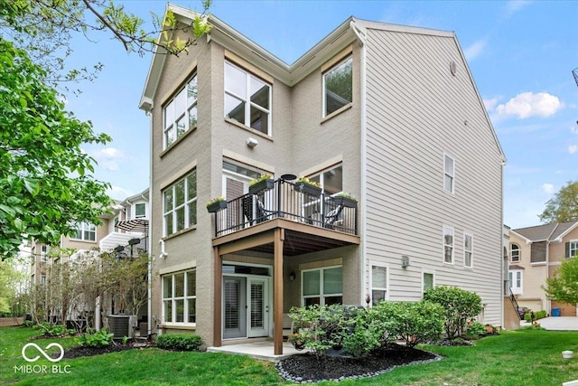 681 Greenford Trl N, Carmel, IN 46032 - back of house with a lawn and a patio area