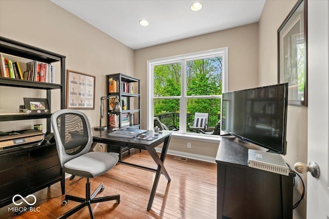 681 Greenford Trl N, Carmel, IN 46032 - office space featuring wood finished floors and recessed lighting