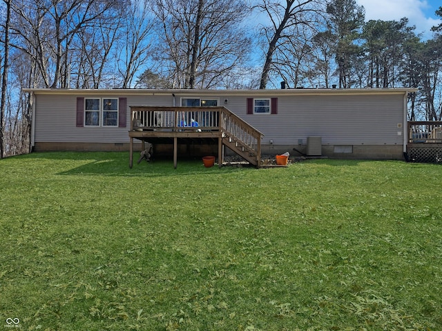 rear view of house with stairs, central AC unit, a lawn, a deck, and crawl space