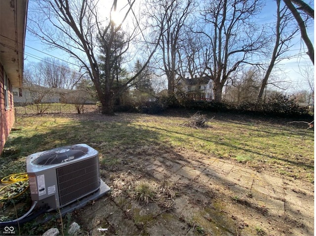 view of yard featuring central AC unit