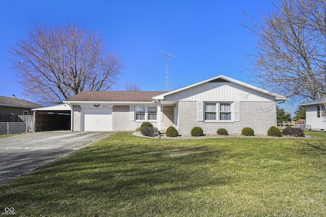 ranch-style home with brick siding, an attached garage, concrete driveway, and a front lawn