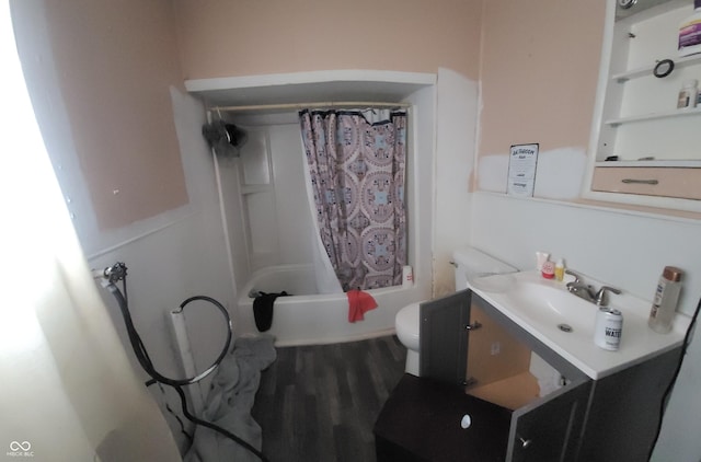 bathroom featuring shower / tub combo, vanity, toilet, and wood finished floors