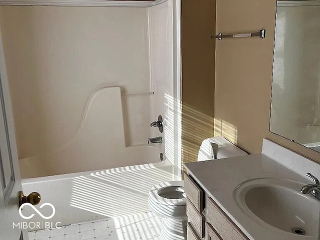 full bathroom with tub / shower combination, vanity, and toilet