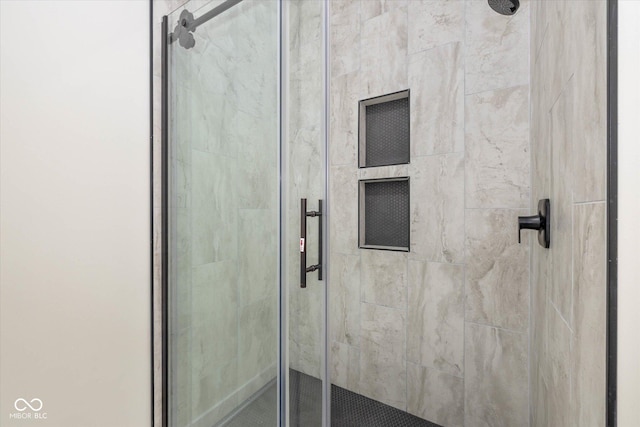 bathroom with a stall shower