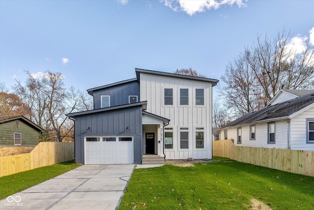 view of front of house with a garage, board and batten siding, driveway, and fence