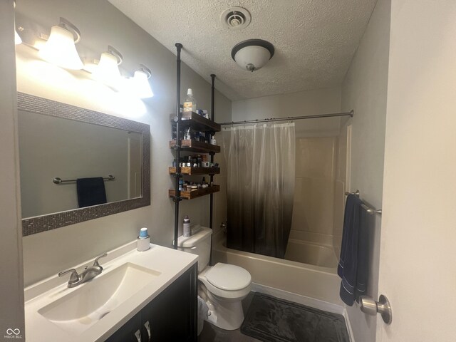 bathroom featuring vanity, visible vents, shower / tub combo, a textured ceiling, and toilet