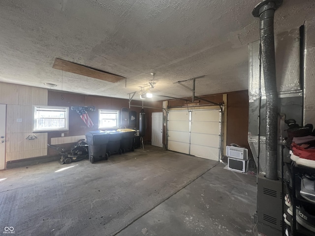 garage with heating unit and a garage door opener