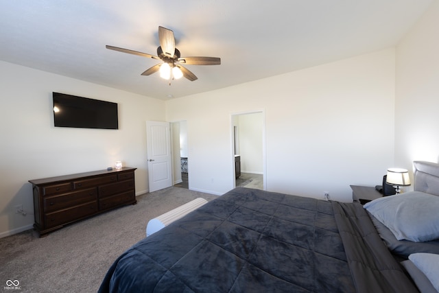 carpeted bedroom featuring baseboards and a ceiling fan