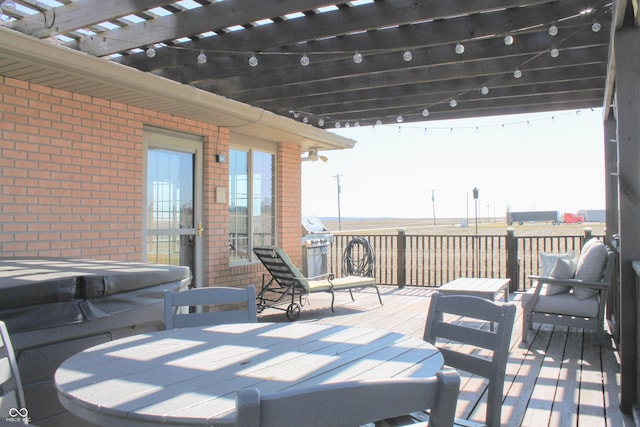 view of patio featuring a deck and a pergola