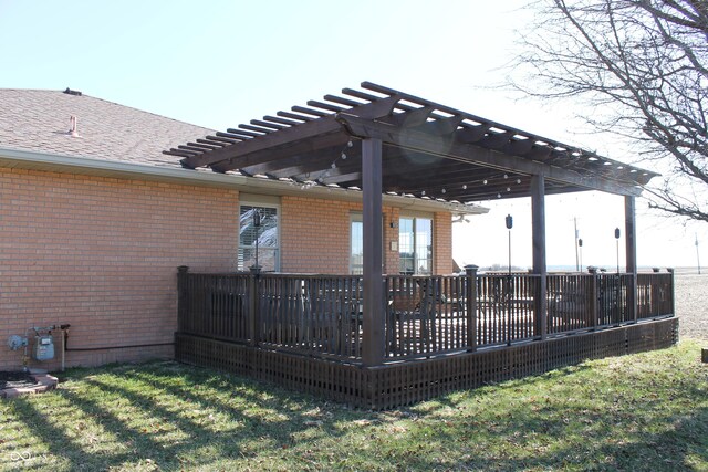 exterior space with a pergola and a wooden deck