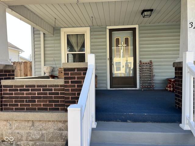 entrance to property with covered porch