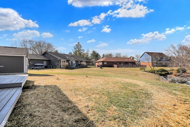 view of yard with an outdoor structure