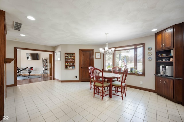 dining space with visible vents, baseboards, light tile patterned floors, recessed lighting, and a notable chandelier