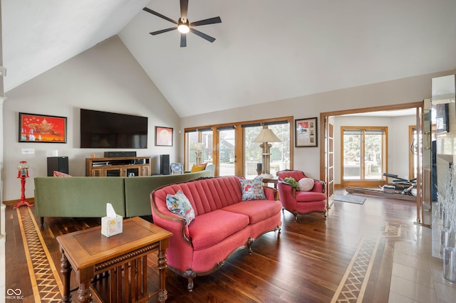 living room with a fireplace, ceiling fan, wood finished floors, and high vaulted ceiling