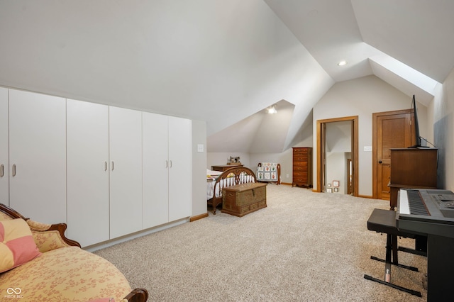 interior space featuring recessed lighting, baseboards, and lofted ceiling