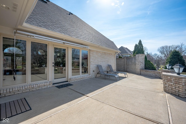 view of patio / terrace featuring fence