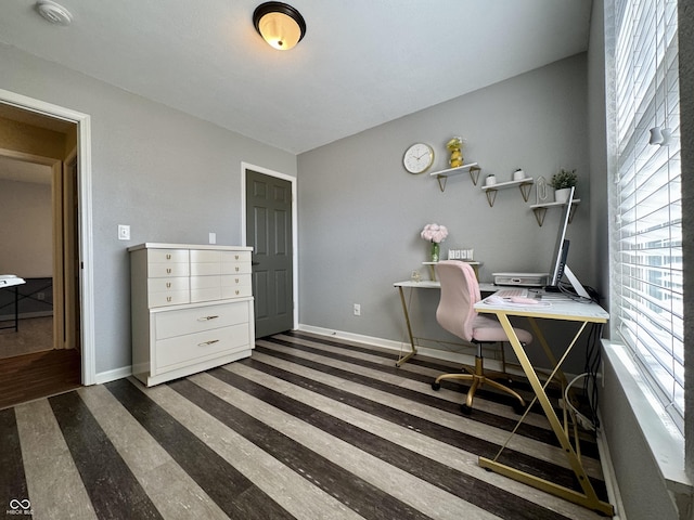 office area featuring baseboards