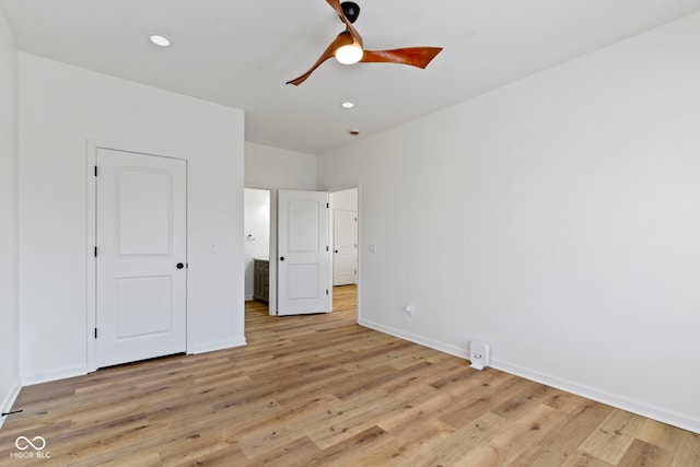 unfurnished bedroom featuring light wood finished floors, recessed lighting, a ceiling fan, and baseboards