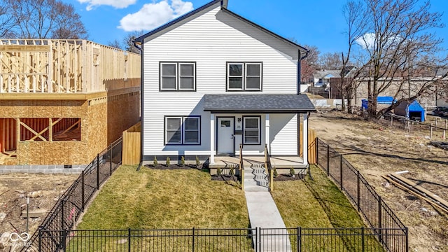 view of front of home featuring fence, a porch, a front yard, and a shingled roof