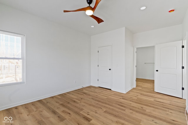 unfurnished bedroom with recessed lighting, baseboards, ceiling fan, and light wood finished floors